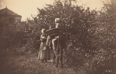 Two Women with Donkey