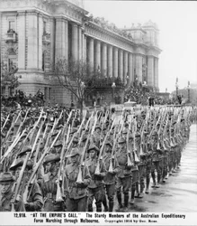 Men of the AIF marching past the Parliament House in Melbourne, their rifles with bayonets fixed, prior to embarkation for overseas service, c. August 1914