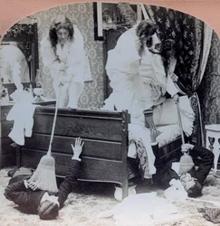 USA: gender scene, young girls repel visitors with brooms, caches under bed