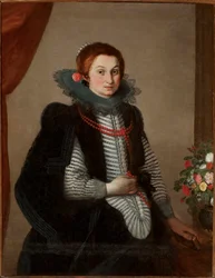 Portrait of young lady with coral necklace