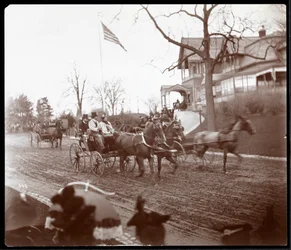 Horsedrawn carriages on Riverside Drive in front of the Claremont Inn, New York