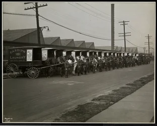 Horsedrawn Delivery Wagons Parked Outside the Carolyn Laundry at 111 East 128th Street, East Harlem, New York, 1929