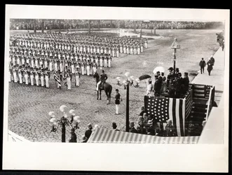 View of Princess Eulalia of Spain reviewing the 7th Regiment marching in the Columbus Celebration Parade at the Savoy Hotel, New York, 1899