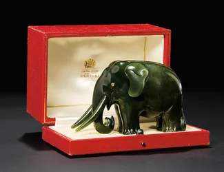 A jewelled nephrite model of an elephant, with diamond-set eyes, c.1900