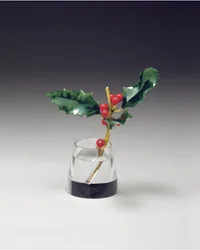 Holly spray in a tapering vase, c.1890