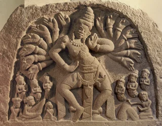 Dancing sixteen-armed Shiva