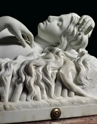 A life-size figure of Rhodopis on plinth