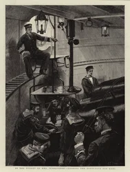 In the Turret of H M S Conqueror, loading the Forty-Five Ton Guns