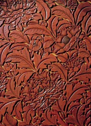 Detail from a carved dish bearing the mark of Xuande (1426-36) in the base, Chinese (detail)