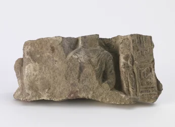 Fragment Showing Torso of Seated Buddha, a Standing Bodhisattva and Two Cartouches on the Front