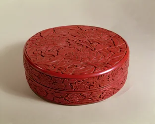 Red lacquer box decorated with peonies