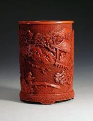 Red moulded brushpot depicting the famous calligrapher Wang Hsi-chih sitting in his pavilion retreat