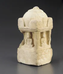 Small stupa, domed roof and Buddhist figures occupying recesses on all 4 faces, square pedestal, Period of Division, 557-581