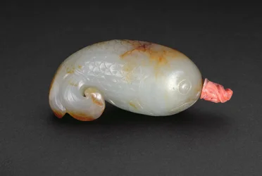 Snuff bottle in the form of a fish with curled trefoil tail (celadon and coral)