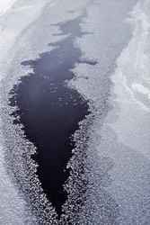 Dark Water Through Ice