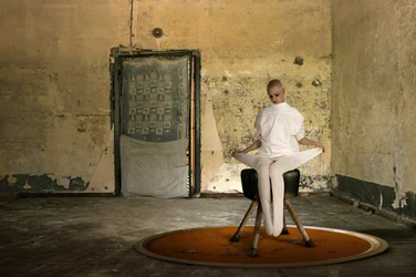 Bald Figure Orange Rug