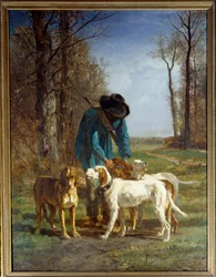 Hunter guards stop by his dogs.