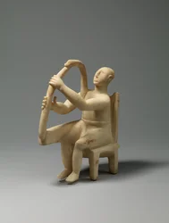 Marble seated harp player, 2800-2700 B.C.