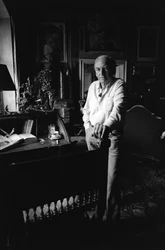 Jiri Mucha Standing by His Desk in His House in Hradcany, Prague