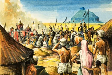 Indian Natives Watch as a Procession of Elephants and Soldiers Approach a Fort