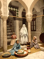 Moorish Women Preparing Couscous in a Courtyard, Algiers, Algeria, c. 1899