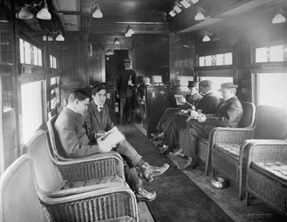 Group of Men Traveling in Buffet Library Car on Deluxe Overland Limited Train, USA, c.1915