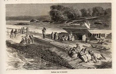 A wooden raft on the Danube for the transport of goods and people. Engraving in Le tour du monde, edited by Edouard Charton