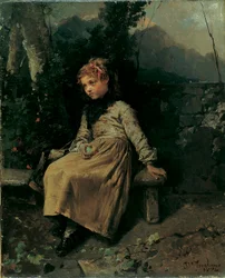 Little girl sitting in garden