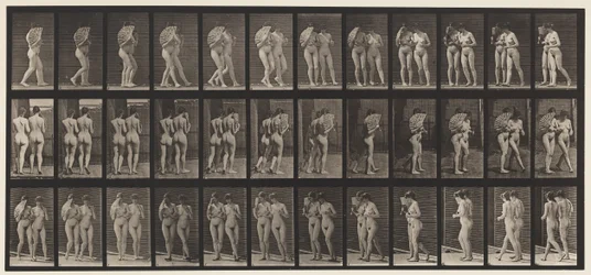 Plate 54. Walking, Two Models, One Flirting a Fan, Arm in Arm