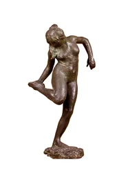 Dancer looking at the sole of her right foot, c1890