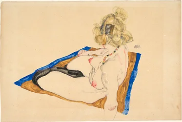 Blonde Nude Seated on a Brown Rug with a Blue Border