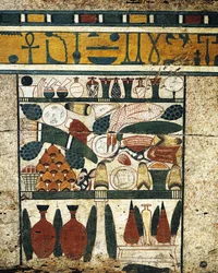 Plastered, painted wood panel detail with heap of funerary offerings, from Sarcophagus of Ibi