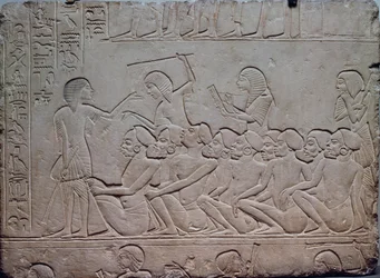 Black prisoners surrounded by armed guards, relief from the Memphite Tomb of Horemheb at Saqqara, Egyptian Civilization, New Kingdom, Dynasty XVIII
