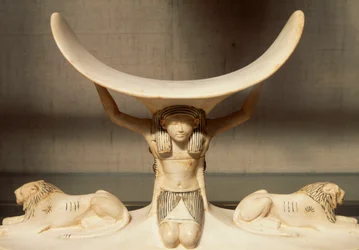 Carved Ivory Headrest Supported by Shu, Personification of Air, from the Tomb of Tutankhamun, Egyptian Civilization, XVIII Dynasty