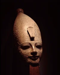 Colossal head of Amenophis III. Rose granite sculpture. 14th century BC. 18th dynasty. Luxor Museum, Egypt