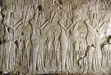 Egyptian antiquity: young girls making offerings. Tomb of Kherouef (18th Dynasty)