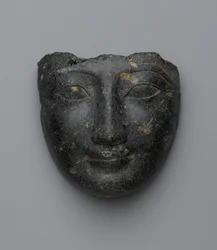 Face from a sarcophagus cover, purchased in Luxor, New Kingdom