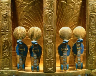 Reverse side of the throne of Pharaoh Tutankhamun with four golden uraeus cobra figures