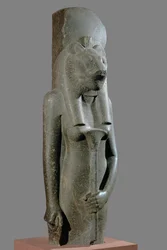 The Goddess Sekhmet holding a sceptre in the form of a papyrus stalk