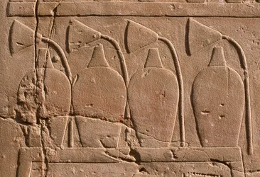 Detail of a relief depicting jars and lotus flowers