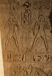 Union between Upper and Lower Egypt and cartouche of Pharaoh, relief on base of thrones, Temple of Ramesses II, Abu Simbel, Egypt, New Kingdom, Dynasty XIX
