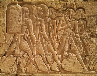Relief Depicting Servants Carrying Rope and Weapons, from the Mortuary Temple of Ramesses III, New Kingdom