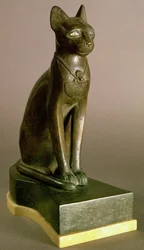 Statuette of a cat representing the goddess Bastet, bearing the cartouche of Psamtek I, Saite Period, c. 664-610