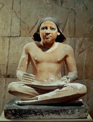 Seated Scribe Holding a Scroll