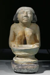 Woman with sieve. From Gizeh, mastaba of Djacha. Middle