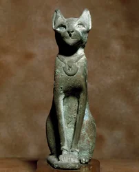 Egyptian Antiquity: The Goddess Cat Bastet. Bronze Sculpture. Turin, Egyptian Museum