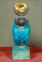 Ancient Egyptian Art: Statuette of the god Thoth as a baboon. Ptolemaic period (332-30 BC). Silver, faience, gold, sculpture. From Hermopolis, Egypt. Height: 0.150 m.
