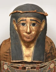 Mummy of Nesmin (detail of mummy mask with plant wreath)