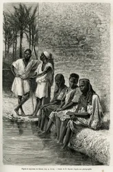 Negres and negresses of the Sahara, on the banks of the Oued Rihr. Engraving by E.Bayard, to illustrate the Algerian Sahara, by V.Largeau, in 1874-1878, published in the Tour du monde, under the direction of Edouard Charton