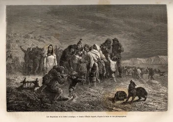 The amazement of the Eskimos discovering the music boxes in the vicinity of Friedrichsthal (Greenland), engraved after the drawing by Emile Bayard, illustrating the voyage of the ships La Germania and La Hansa to the North Pole in 1869-1870, by Captain He